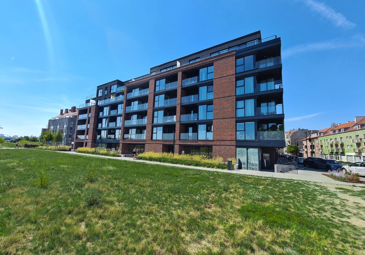 Widok na Wartę i Ostrów Tumski z tarasu apartamentu